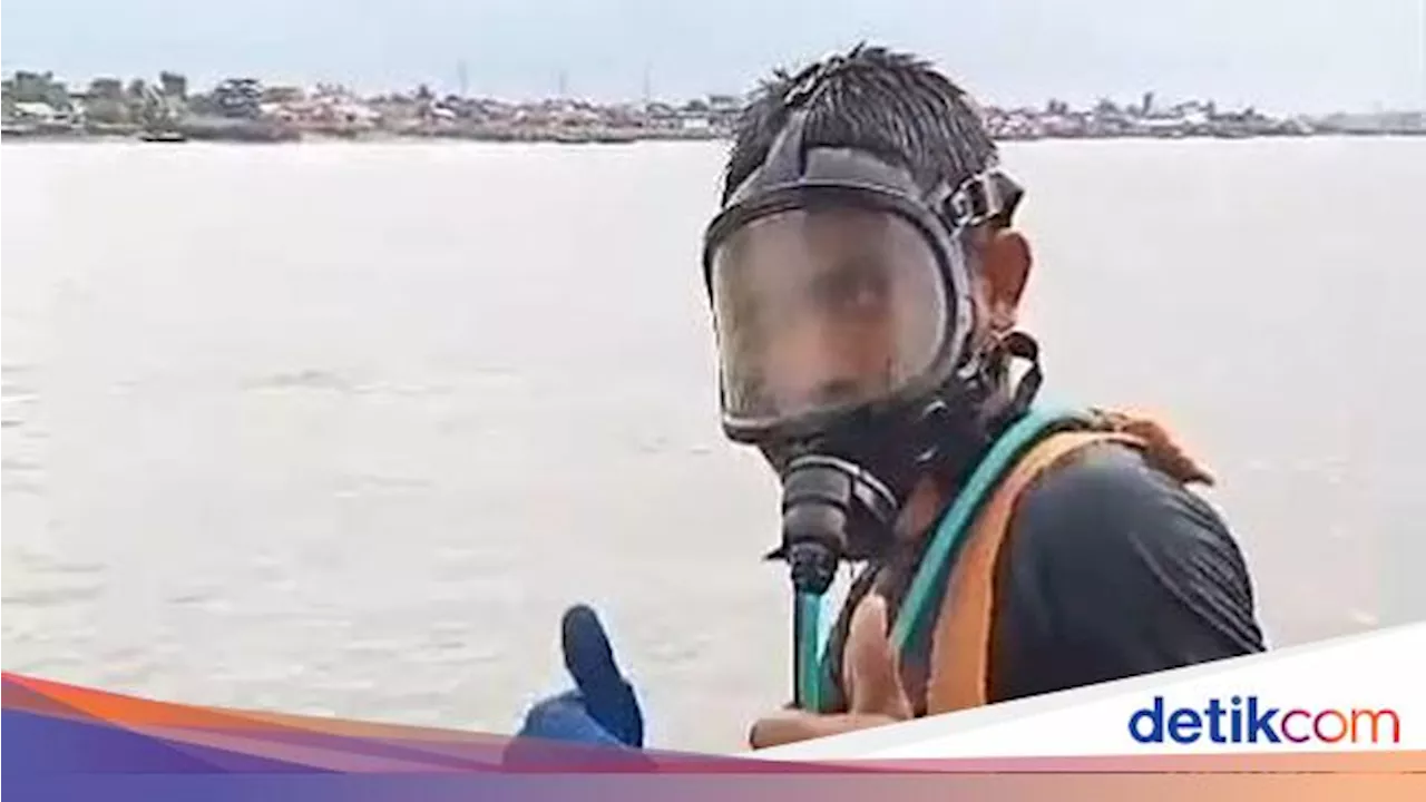 Bertaruh Nyawa di Kegelapan Dasar Sungai Musi