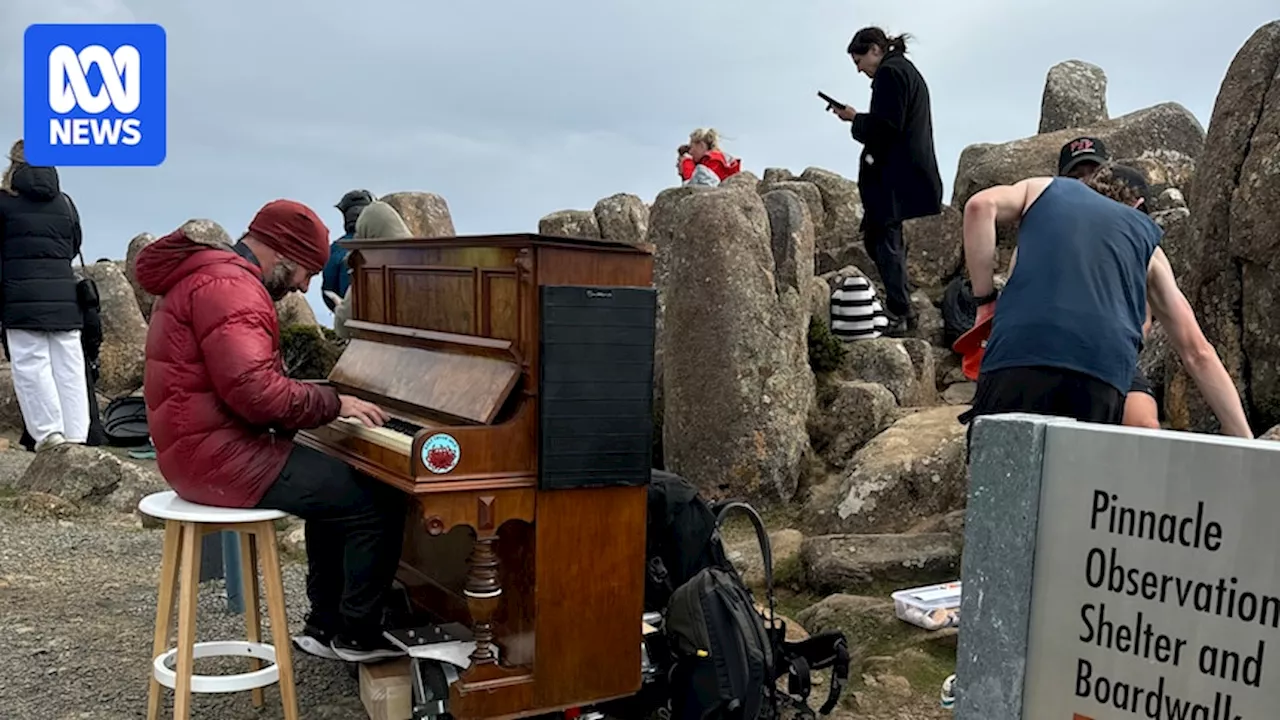 Tasmanian Kelvin Smith pushes piano to top of Hobart's kunanyi/Mount Wellington