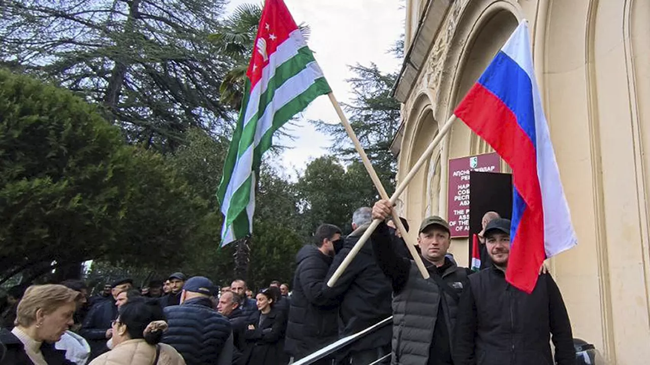 Protesters in separatist Georgian region occupy government buildings, calling for leader's ouster