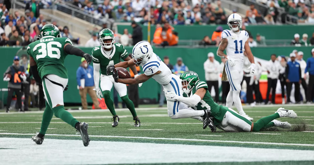 Jets finally get their offense going, but self destruct on defense late in loss to Colts