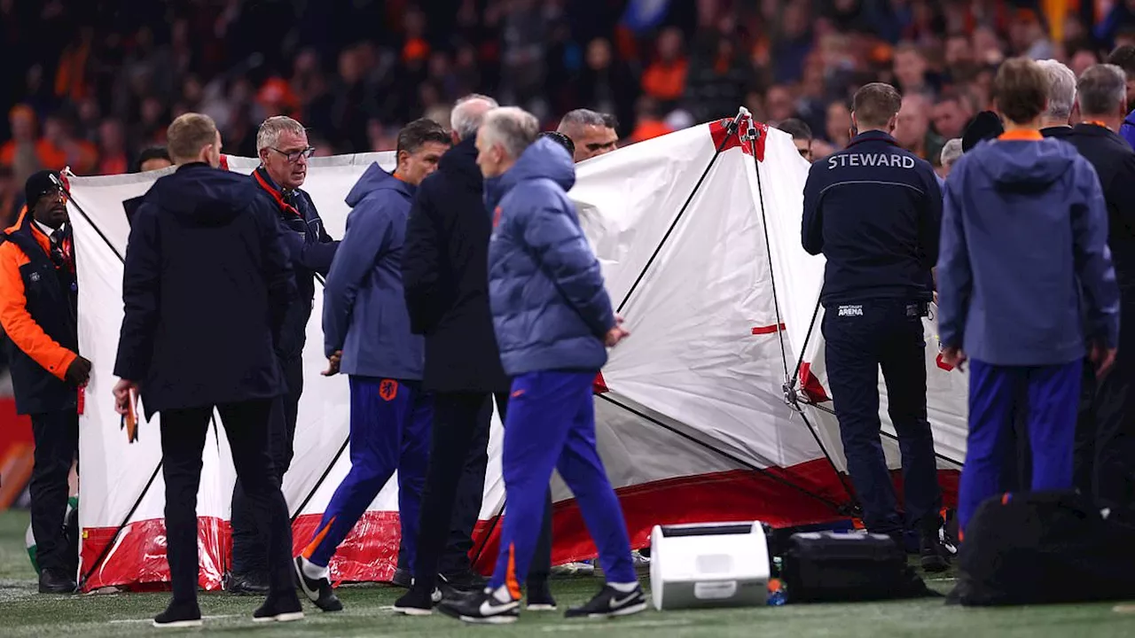 Hungary coach collapses in the dugout during Nations League clash against Netherlands as match is...