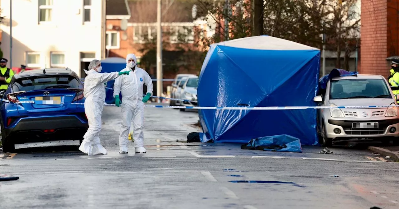 Forensics and armed police descend as police investigate double murder