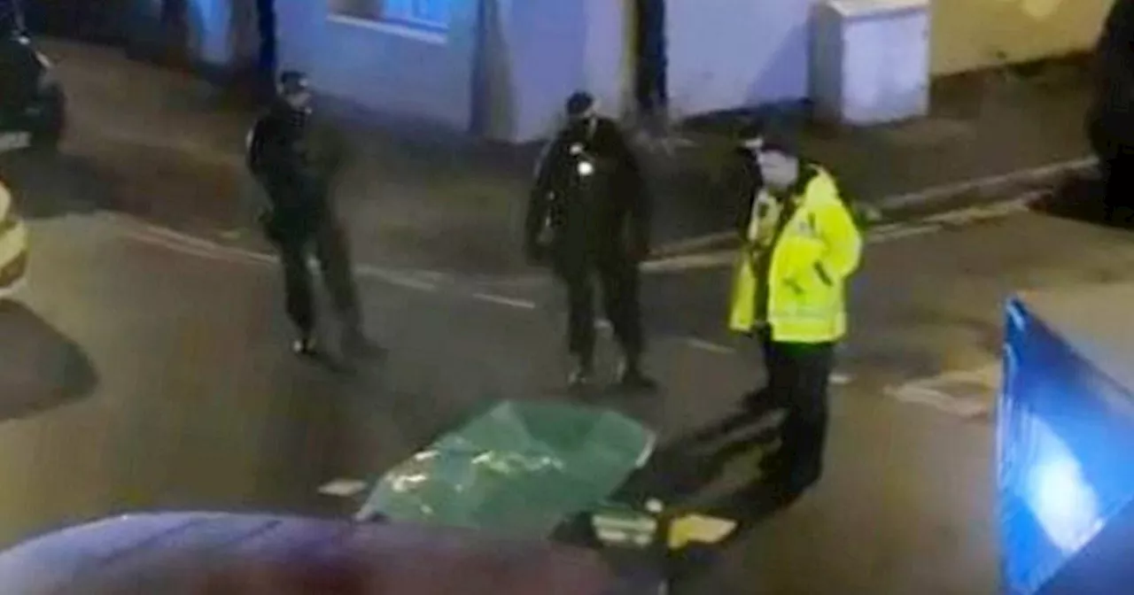 Man arrested for murder after two found dead on street in Manchester