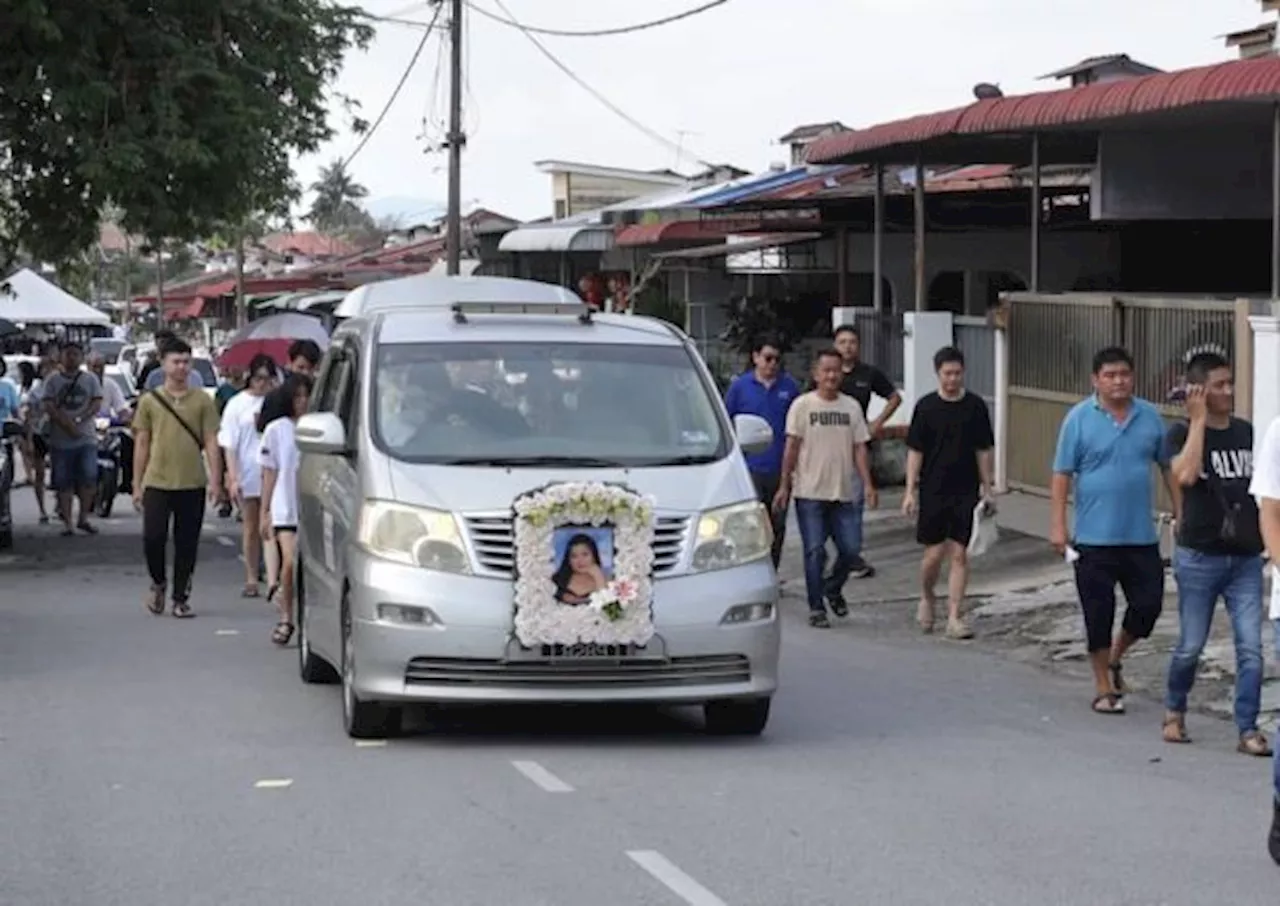 Family, friends pay last respects to Penang woman crushed by container