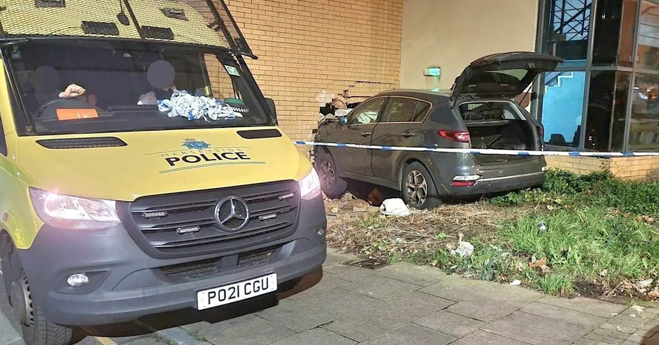 Police officers taken to hospital after car crashes into City of Liverpool College building