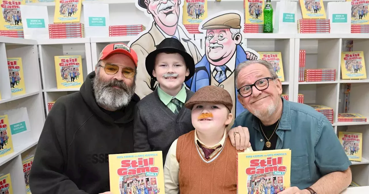 Still Game stars Greg Hemphill and Ford Kiernan meet their mini lookalikes at book signing