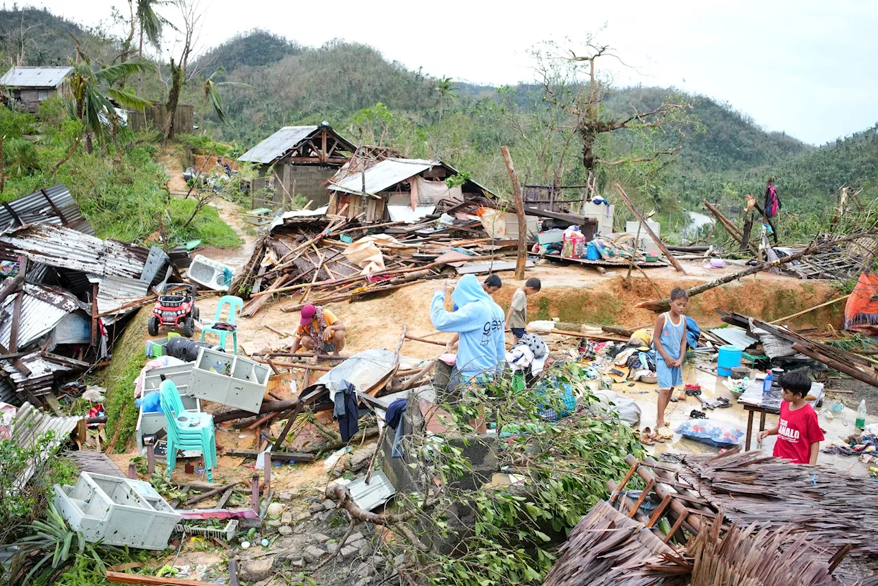 Philippines cleans up as typhoon death toll rises