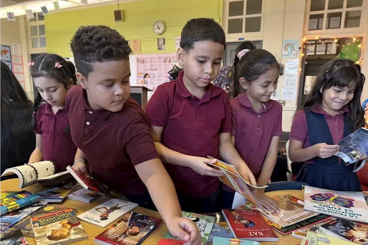 Book giveaway at Kensington school offers something to celebrate: ‘This is democracy in action’