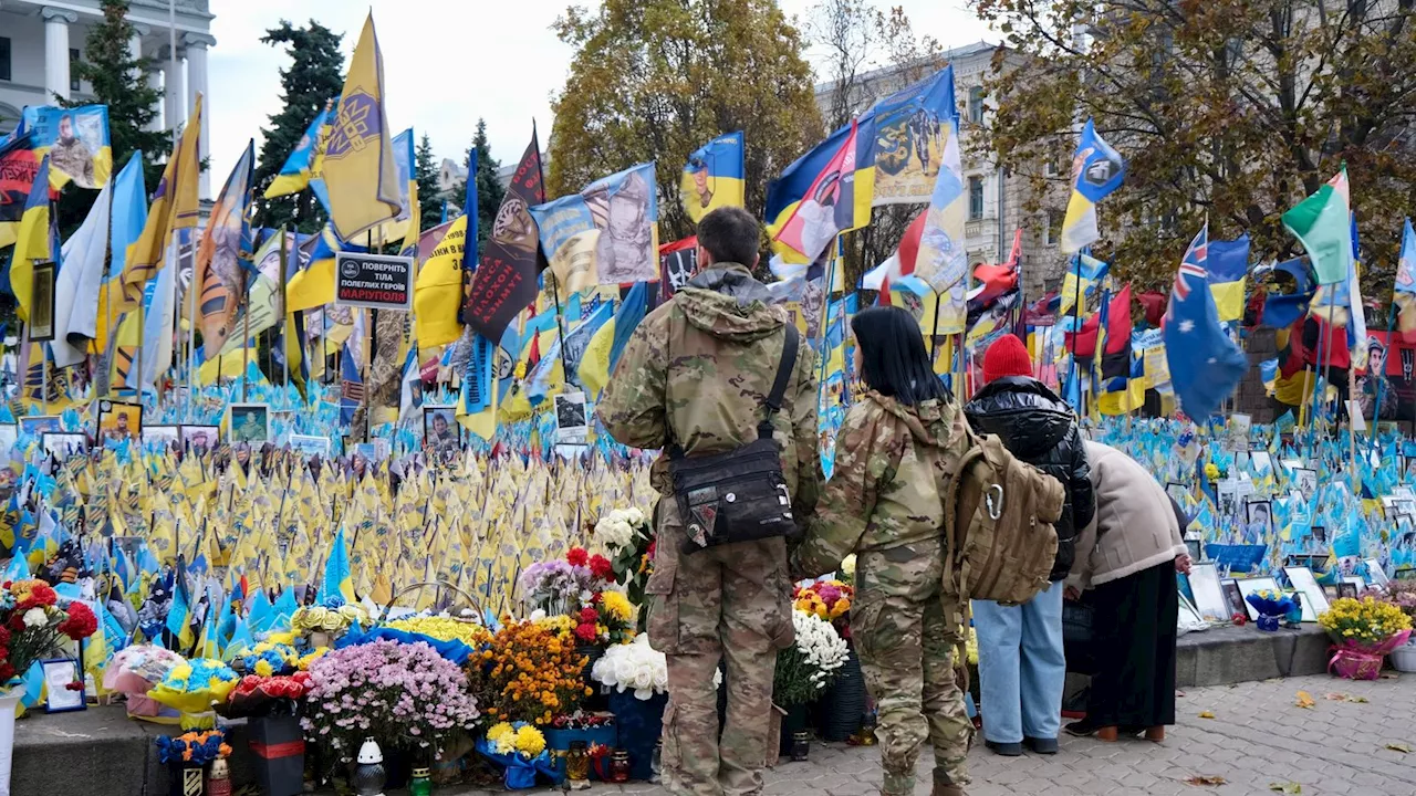 Ukrainians mourn their war dead after almost 1,000 days of war