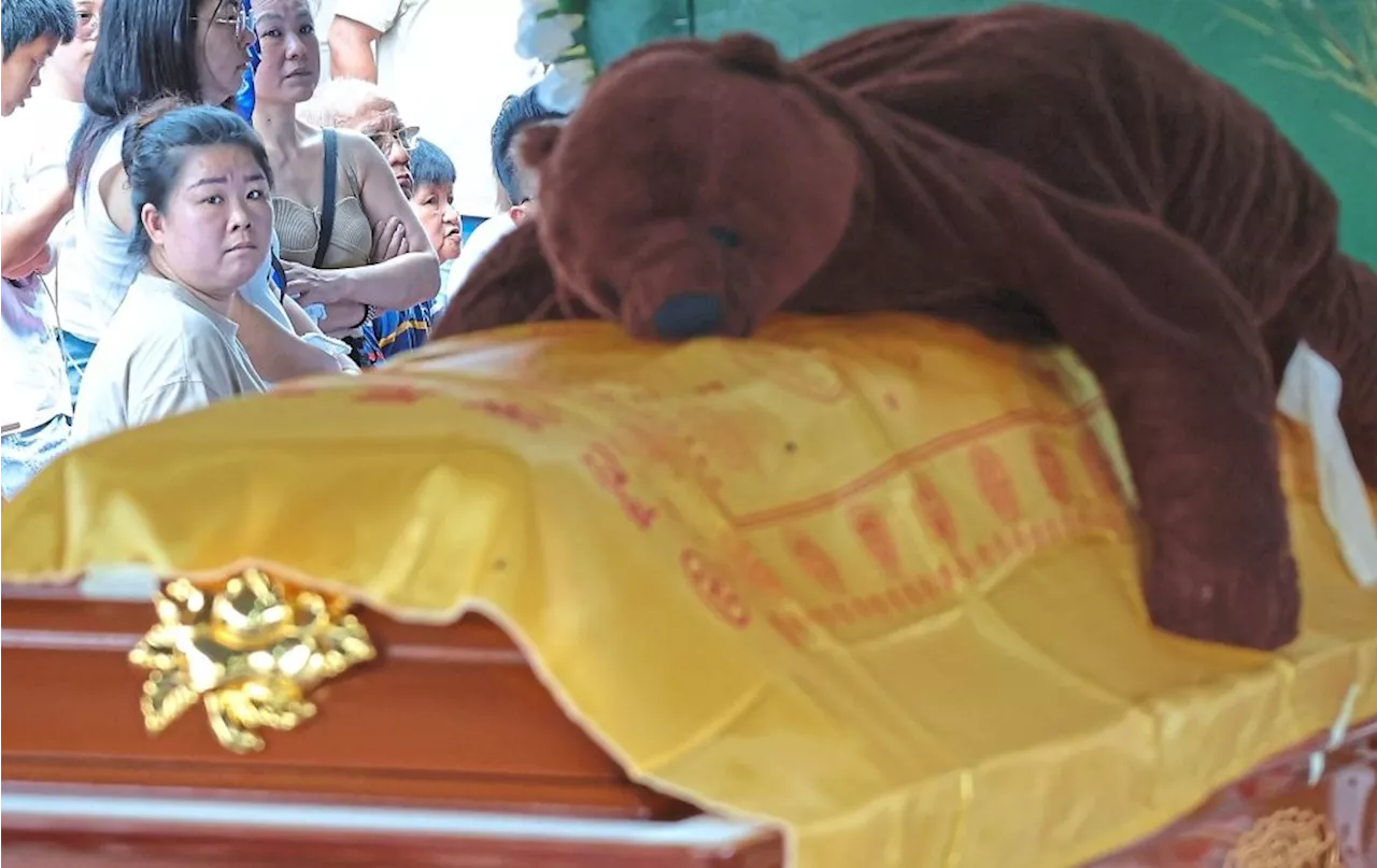 Accident victim laid to rest with beloved teddy