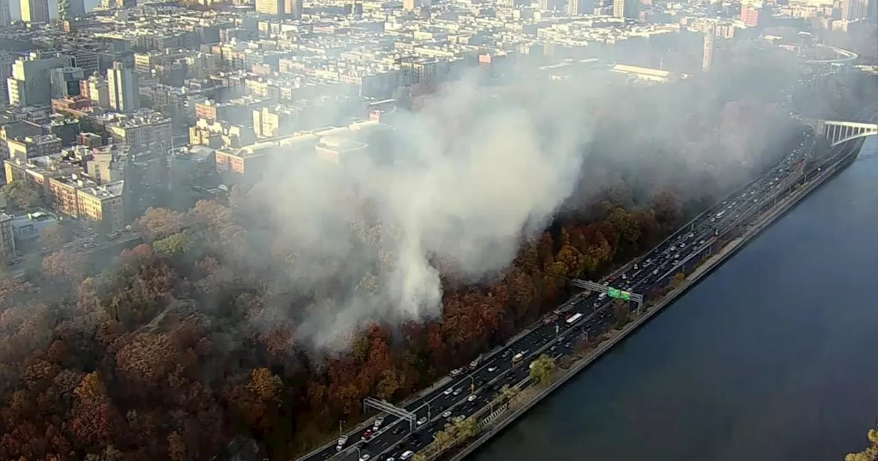 Crews battle 10-acre brush fire in Washington Heights park