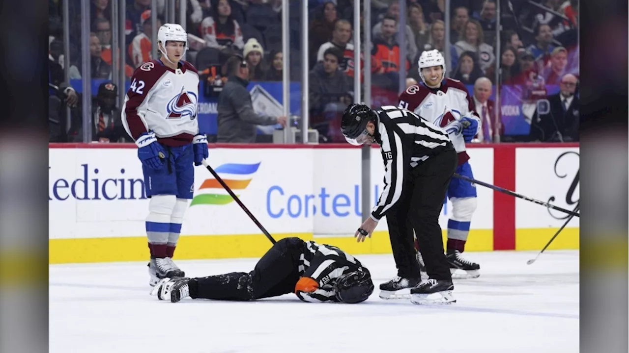 NHL referee Mitch Dunning communicative, can move extremities following violent collision