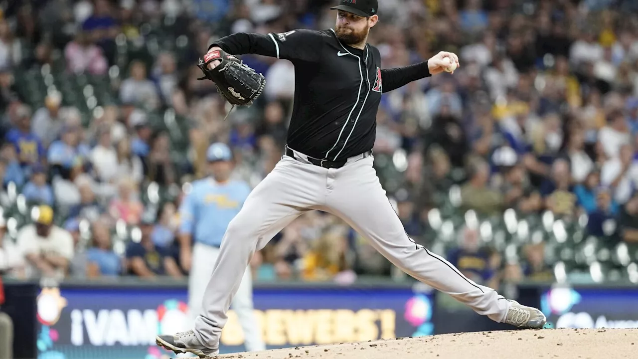 Montgomery exercises $22.5M option with D-backs, Pederson opts out, AP source says