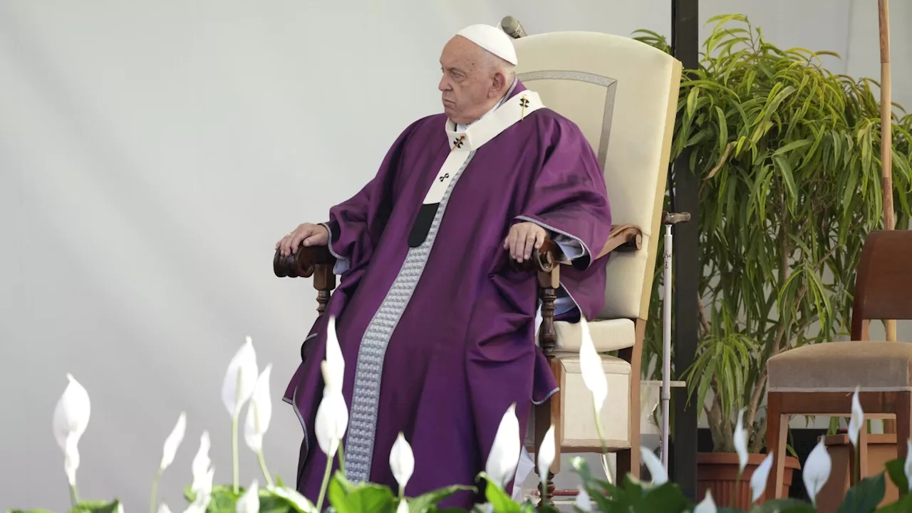 Pope Francis prays in front of graves of unborn children ahead of All Souls' Day Mass