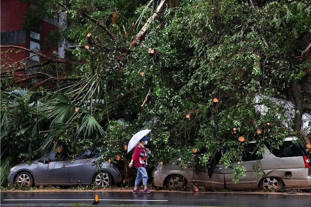 Japan urges 200,000 people to evacuate due to heavy rain; dangers of tropical storm still high