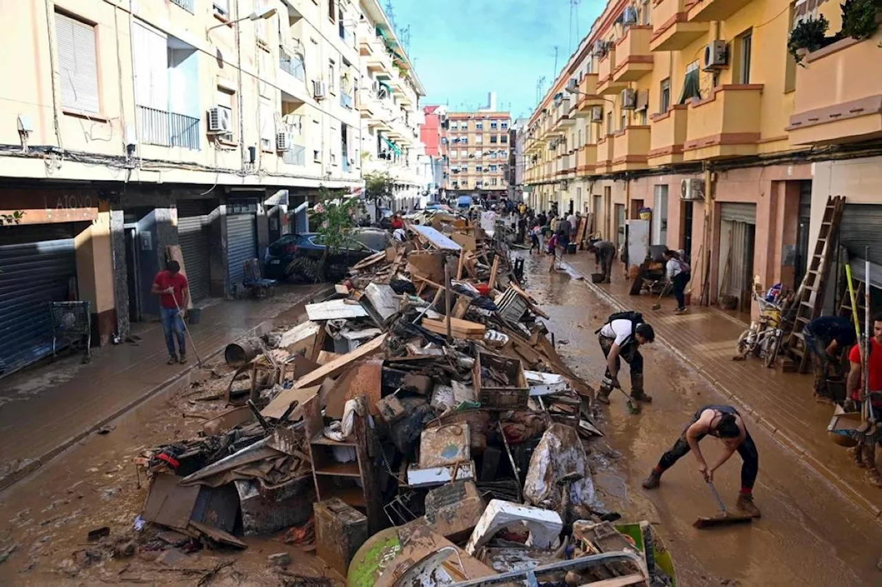 Spain flood toll tops 200, hopes