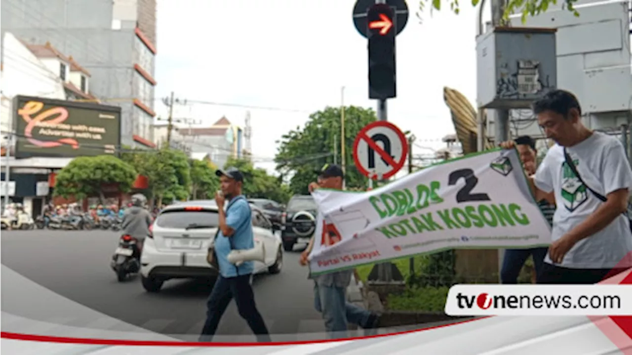 Kampanye Coblos Kotak Kosong Semakin Masif di Pilkada Surabaya, Sosialisasi di Lampu Merah Kertajaya