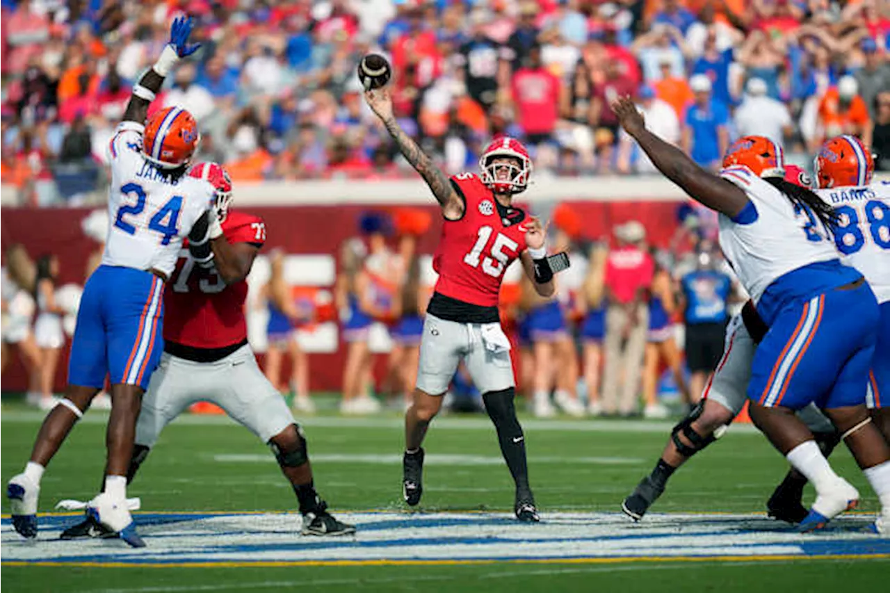 Carson Beck overcomes 3 INTs to lead No. 2 Georgia to a 34-20 win over Florida in 'Cocktail Party'