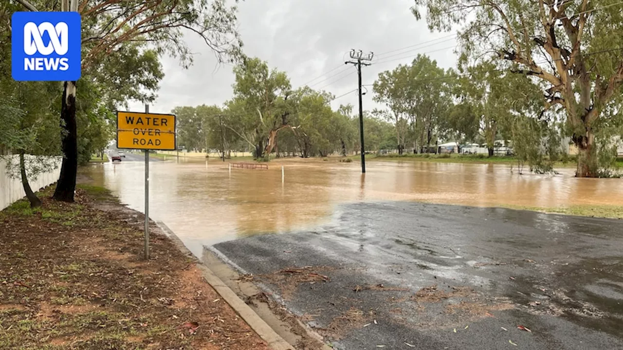 Parts of Queensland brace for heavy rain as more than 180mm falls in 24 hours