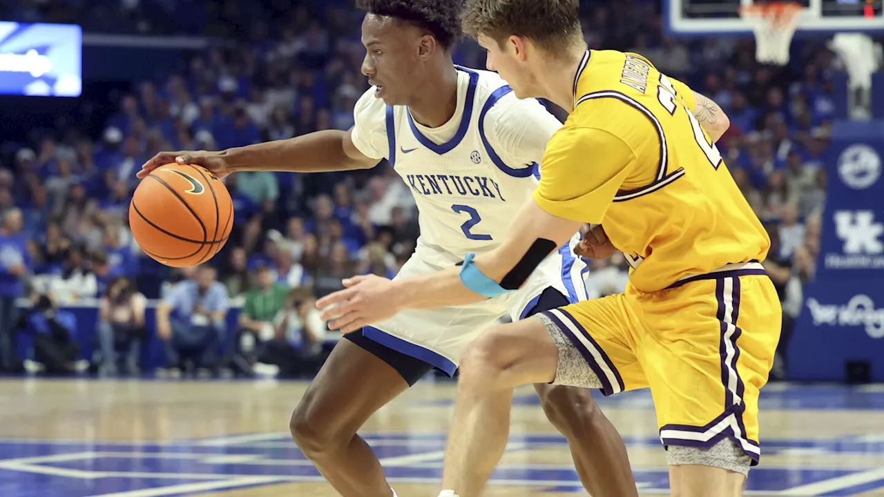 Robinson scores 20 points and No. 9 Kentucky rides hot shooting to blow out Lipscomb 97-68