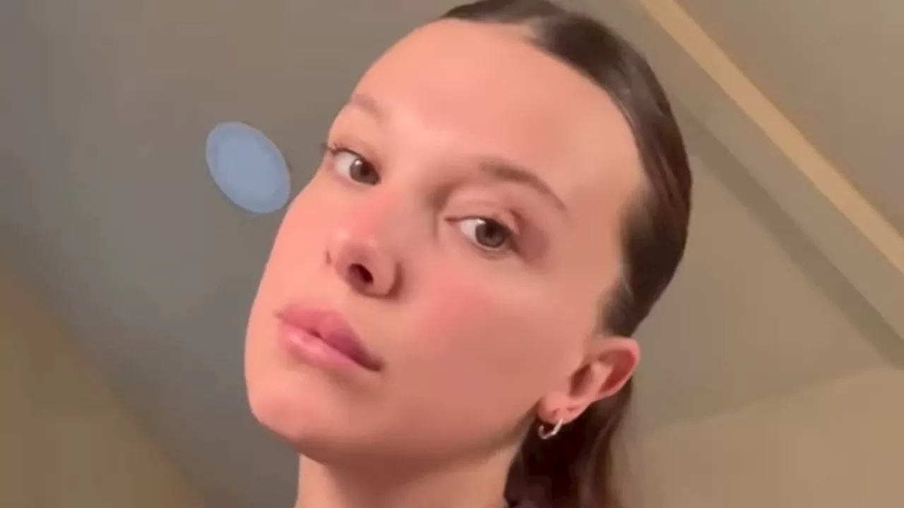 Millie Bobby Brown gives glimpse at her TWO wedding rings from Jake Bongiovi as she plugs beauty...