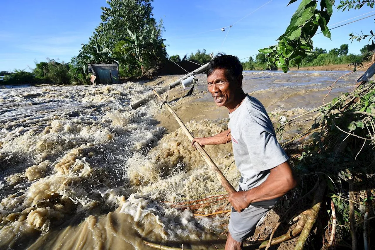 Burst dike leaves Filipino farmers under water