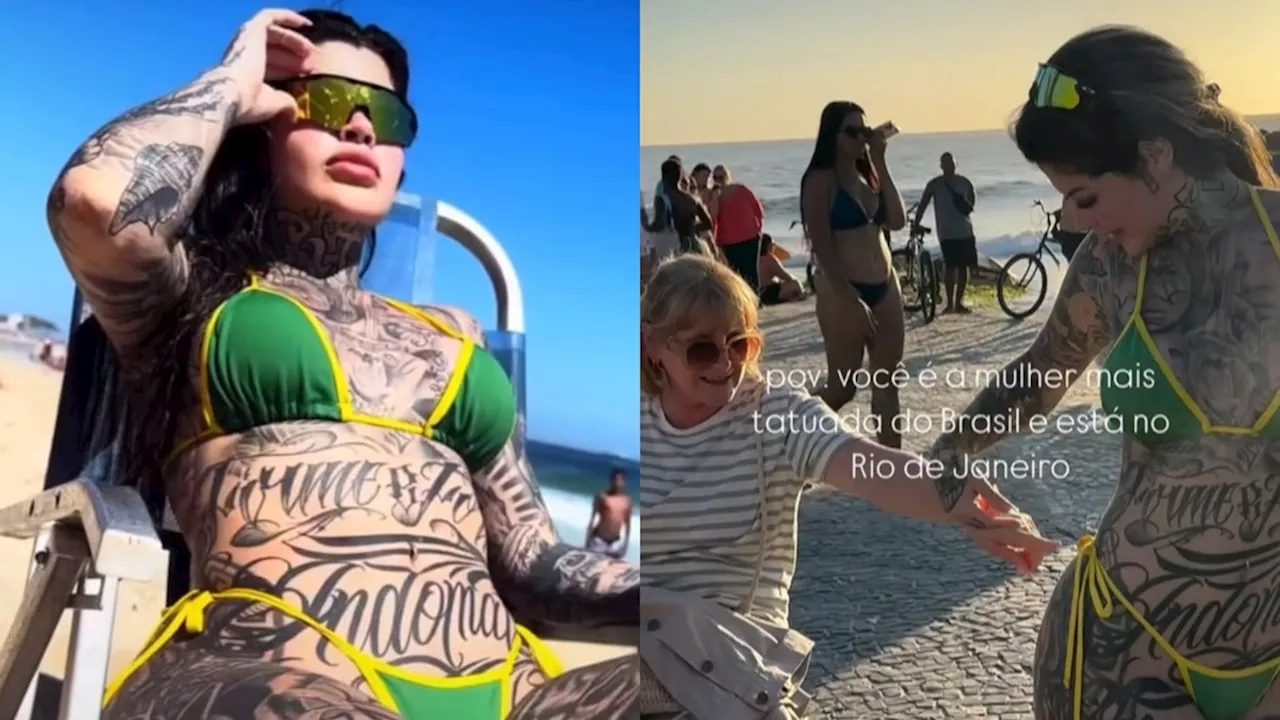 Modelo 'mais tatuada do Brasil' impressiona turistas em praia do Rio: 'Parando a cidade maravilhosa'