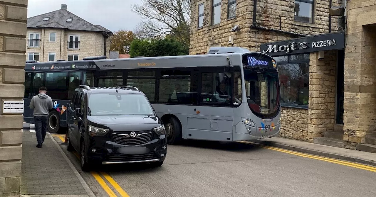 Anger as 'perfectly legal' parked cars block Leeds buses from leaving station