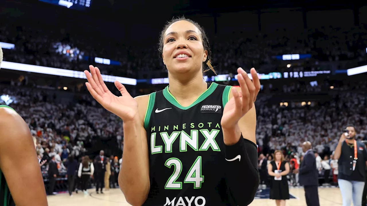 WNBA stunner Napheesa Collier sparkles in 'business woman' crop top