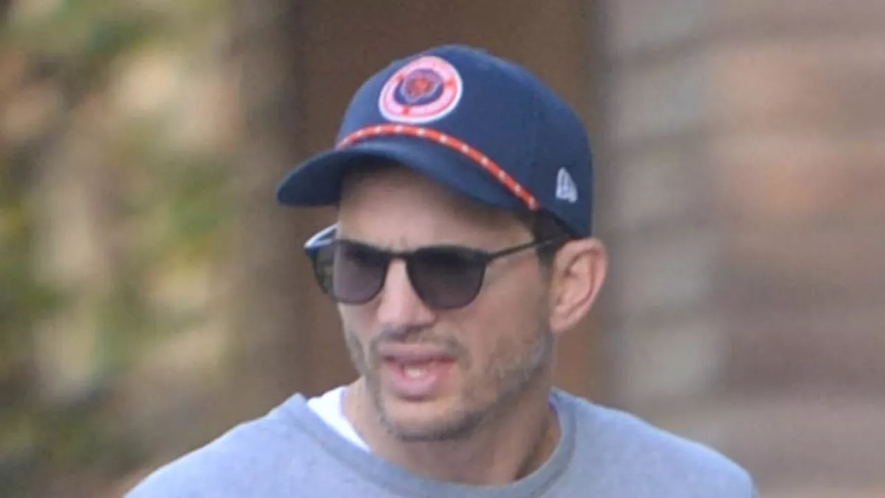 Ashton Kutcher looks tense during chat on LA walk after Mila Kunis divorce rumors and Diddy drama