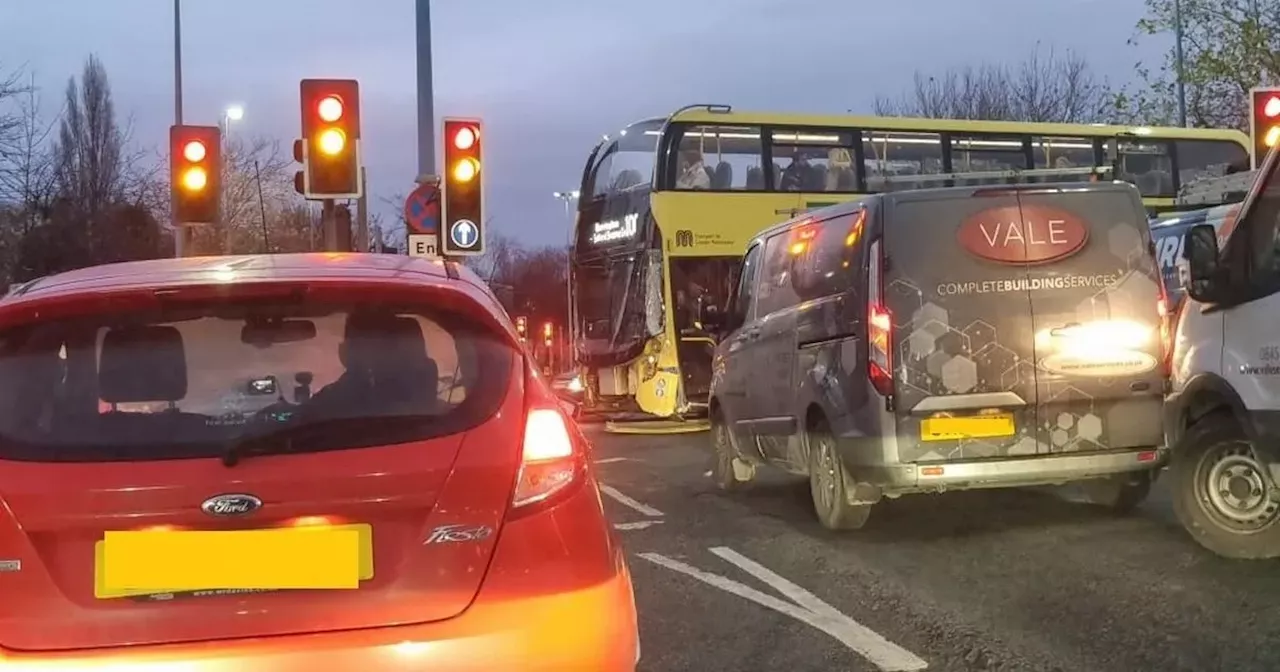 TfGM issues statement after bus crash on roundabout next to retail park