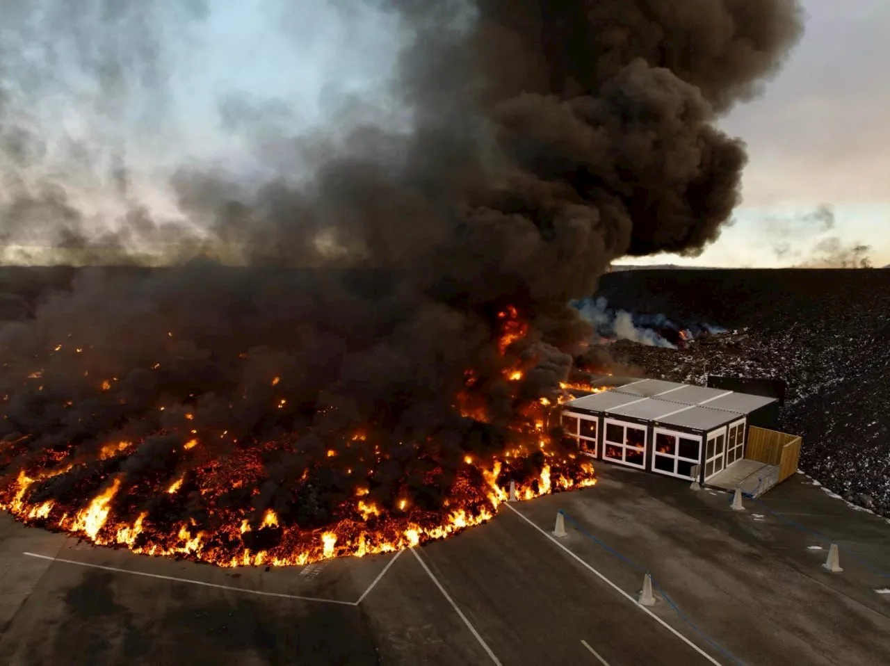 Lava covers parking lot at famed Iceland geothermal spa