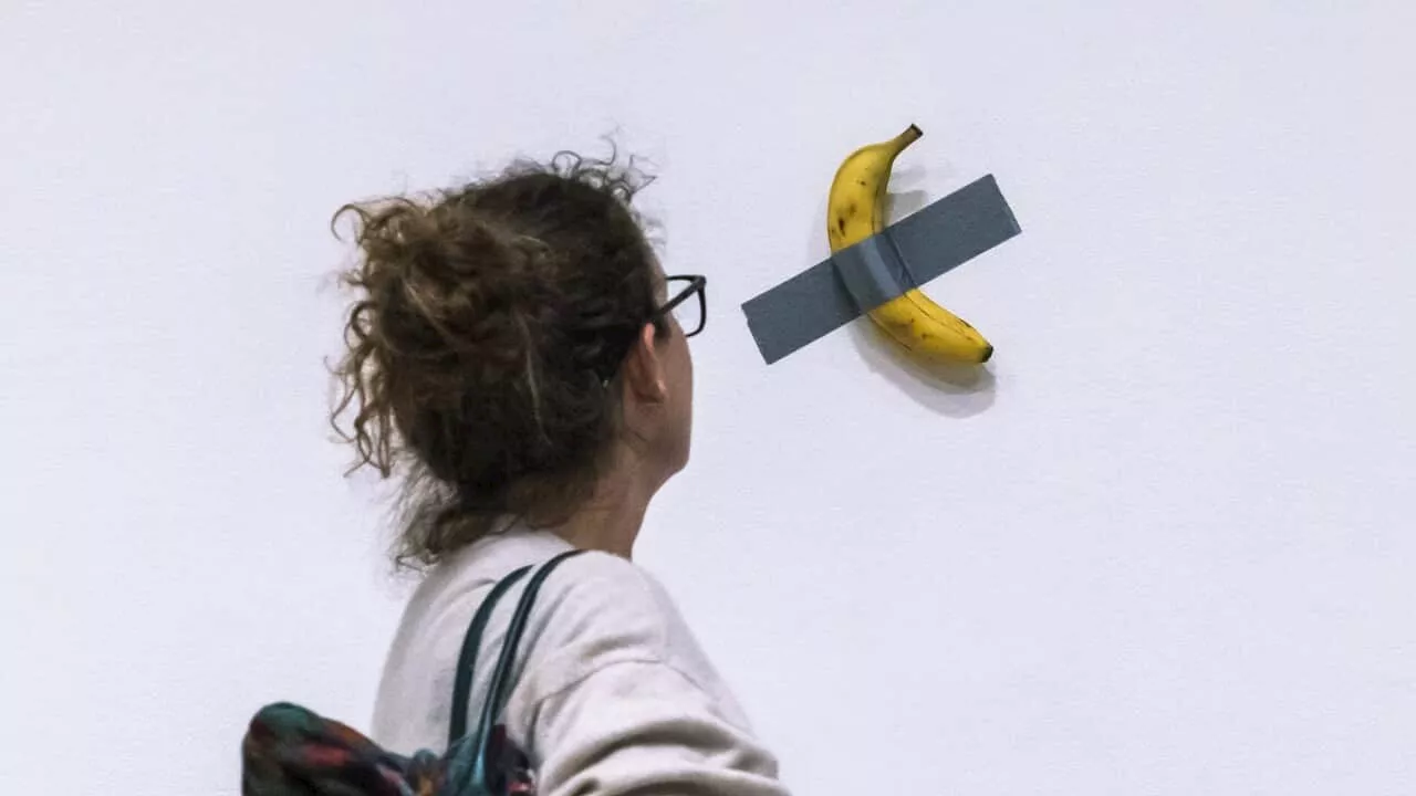 Banana duct-taped to a wall sells for nearly $10 million at New York auction