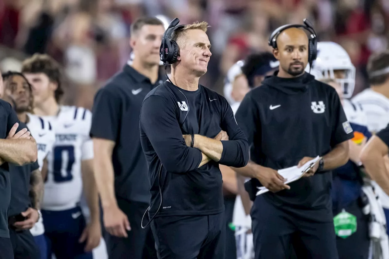 Former Aggie football coach sues Utah State for $15 million