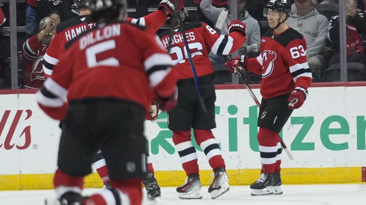 Bratt scores 2 goals, assists another in Devils' 4-2 win over Hurricanes