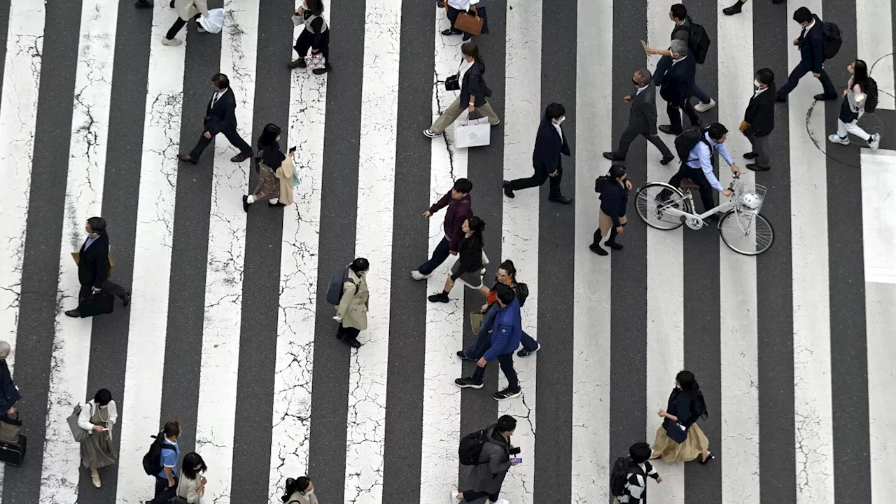 Japan passes $250B economic package meant to lift wages and spur growth