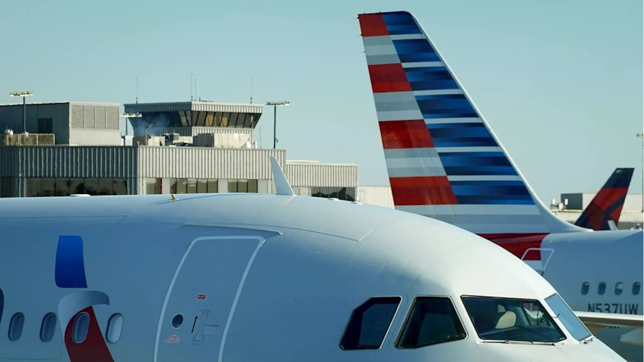 Unruly passenger duct-taped after trying to open a plane's door mid-flight