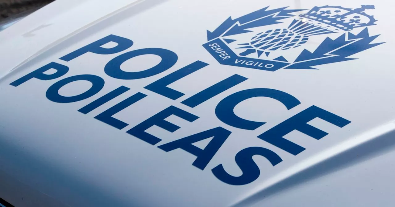 Police hunt for two balaclava-clad thieves who stole safe from Scots property