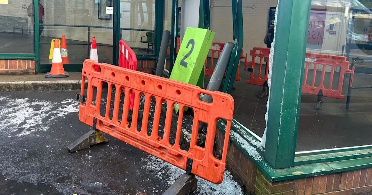 Driver crashes into bus station and smashes windows as site closed