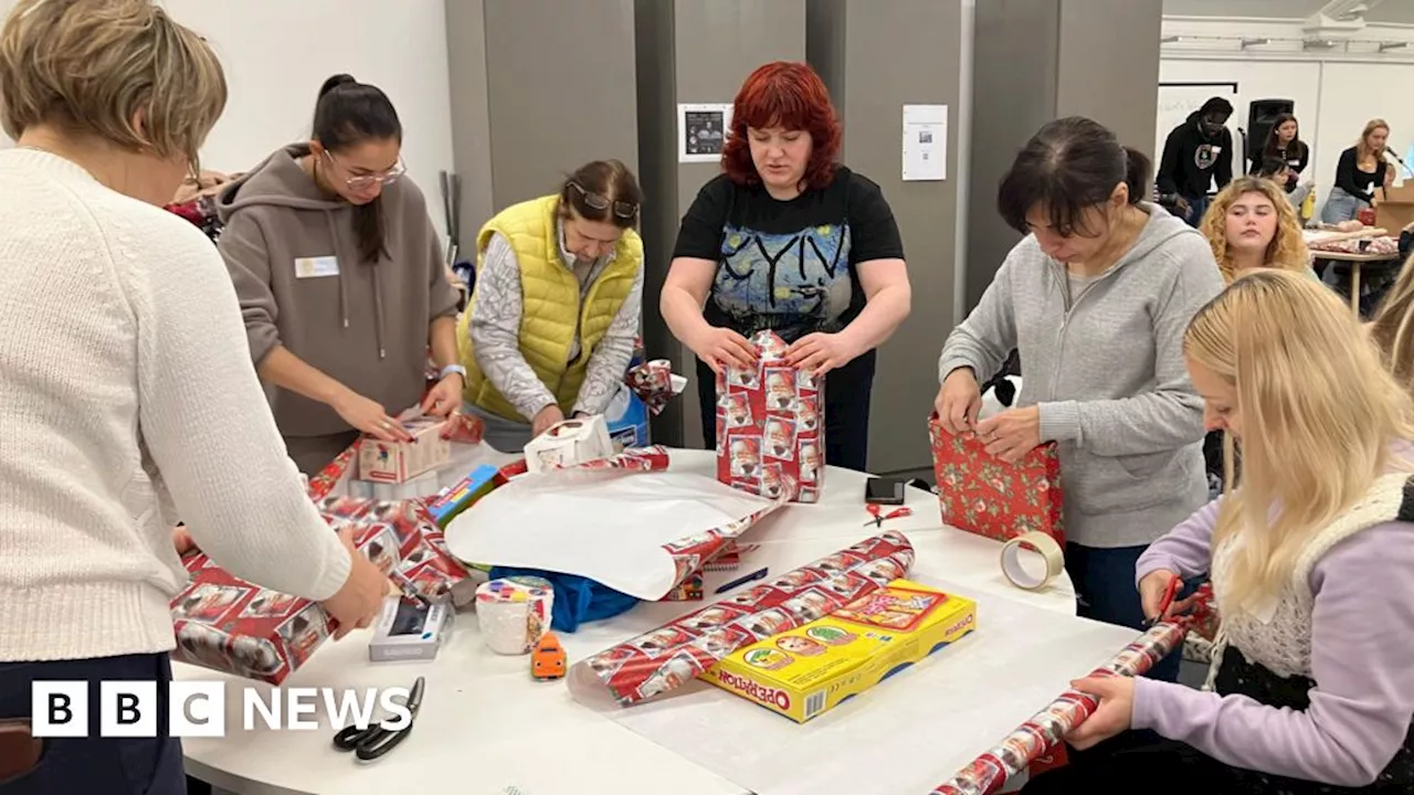 Bath, Swindon and Ipswich volunteers wrap gifts for Ukraine