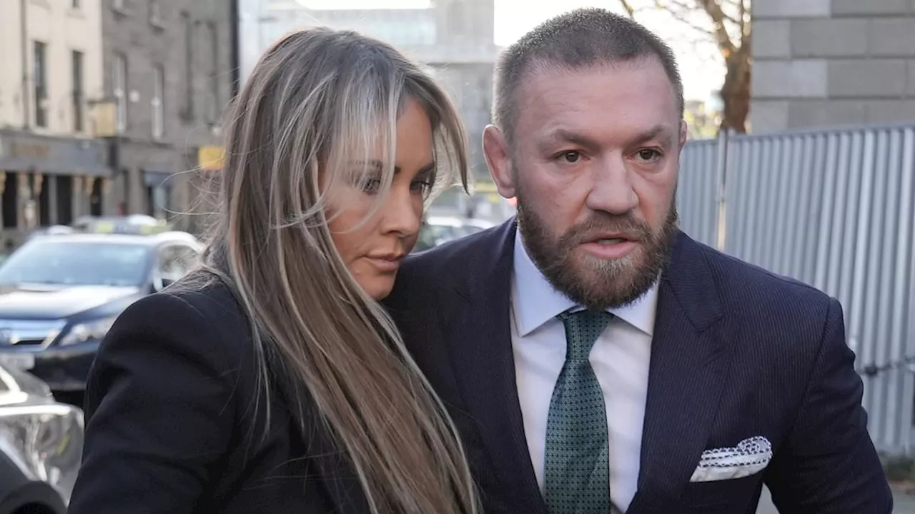 Conor McGregor arrives at court with his partner Dee Devlin and his parents as jury deliberate...