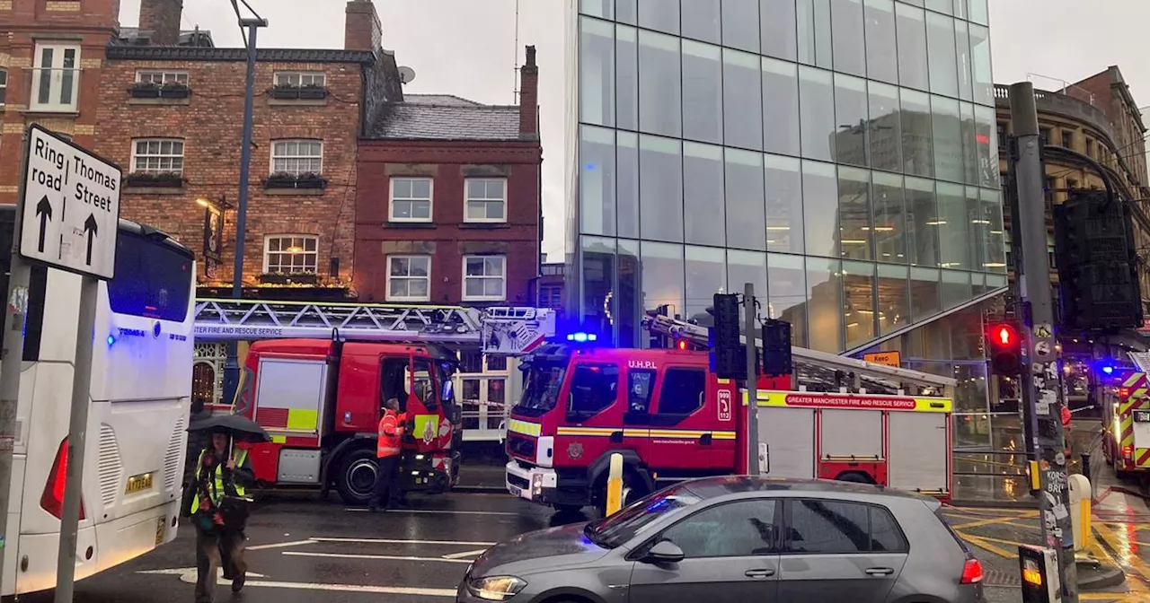 Fire crews tackle blaze in Manchester city centre building