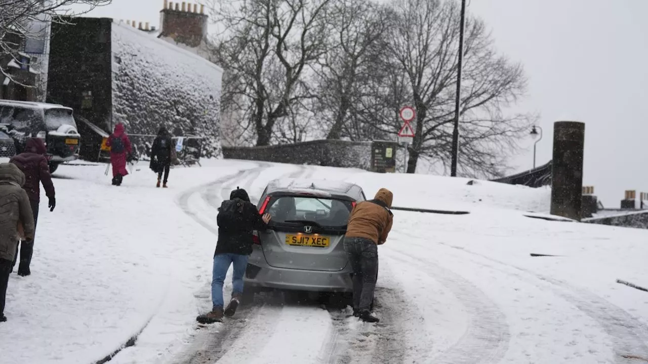 Storm Bert batters UK with 70mph winds, heavy rain and snow