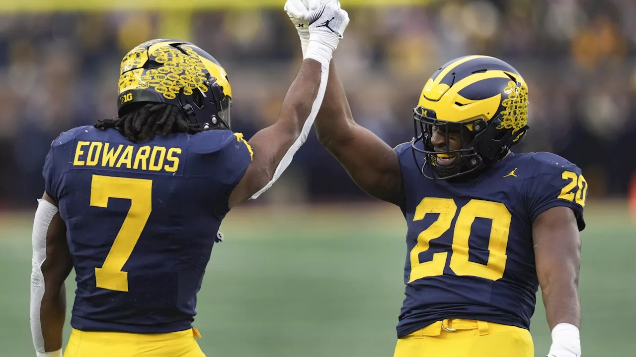 Kalel Mullings runs for career-high 3 TDs, Michigan beats Northwestern 50-6 to become bowl eligible