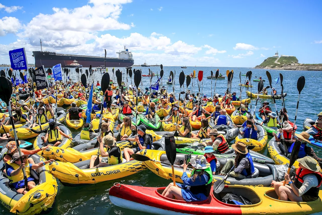 More than 100 people arrested after Australia climate protest forces ship to turn back from coal port