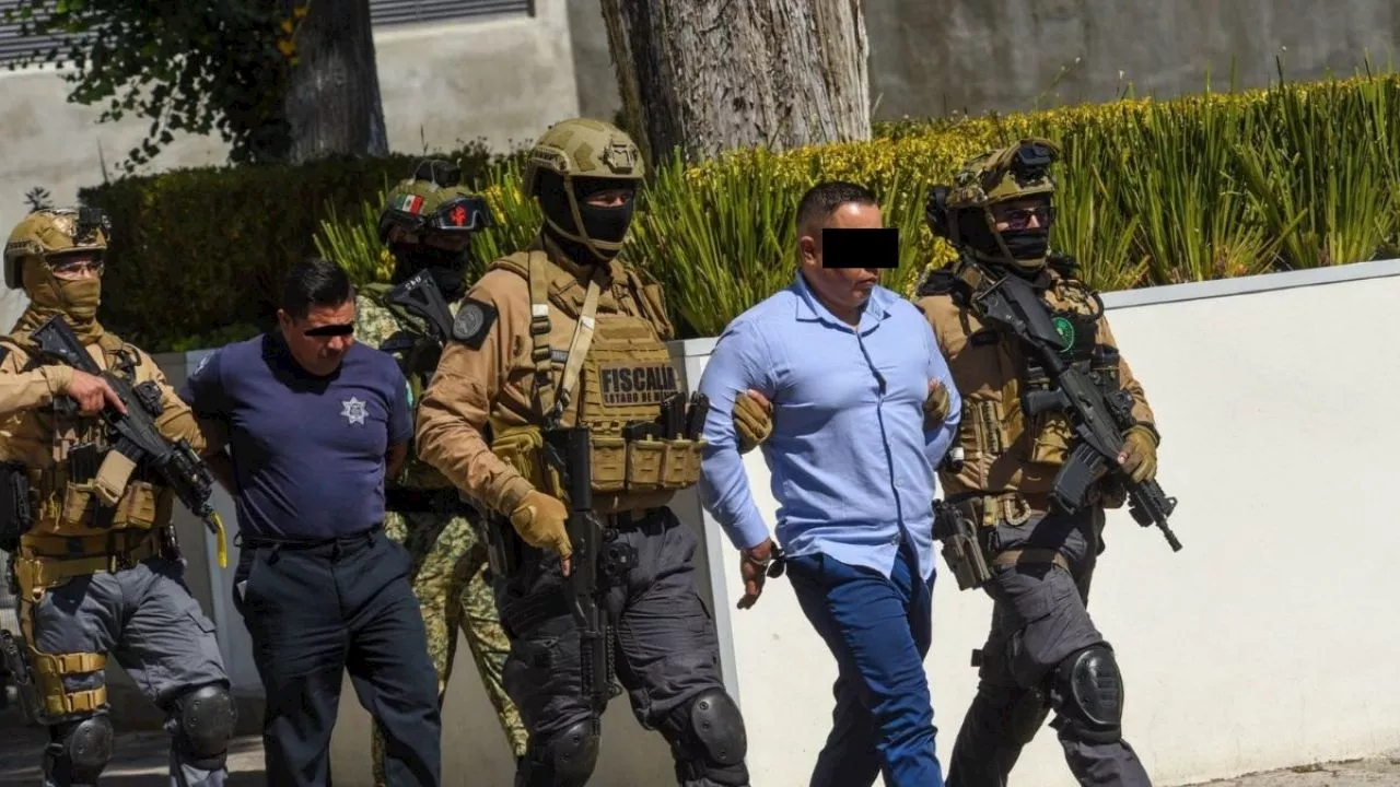 Comisario y sicario detenidos por secuestro exprés en Puebla