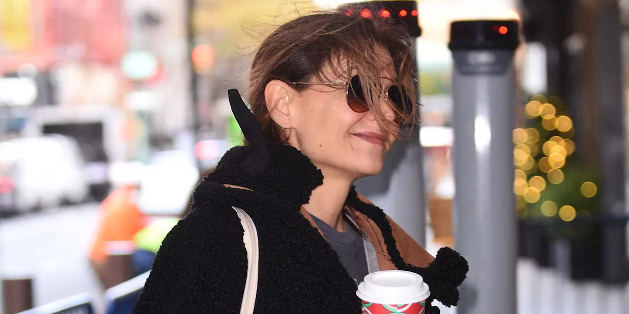 Katie Holmes Paired Luxe Green Silk Pants with Chaotic Clashing Socks