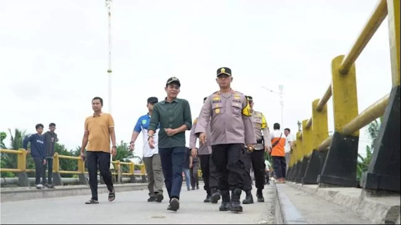 Jembatan di Rokan Hulu Miring Akibat Debit Air Sungai Tinggi dan Deras, Kapolres Turun ke Lokasi