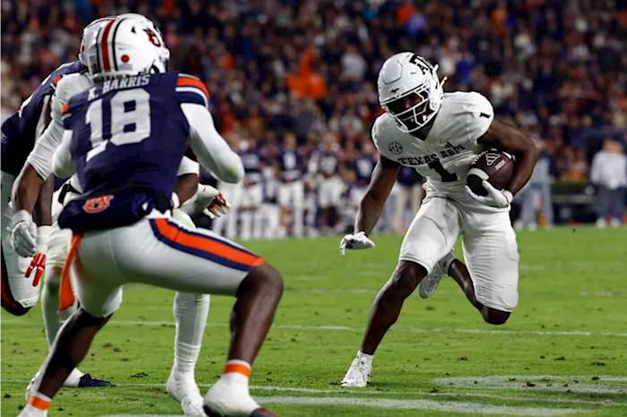 AP Top 25: Texas A&M takes a tumble after quadruple-overtime loss to Auburn