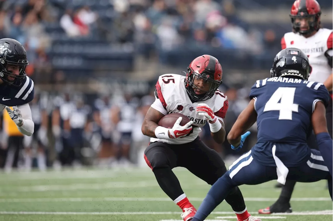 Aztecs go from dominating to dominated in 41-20 loss at Utah State